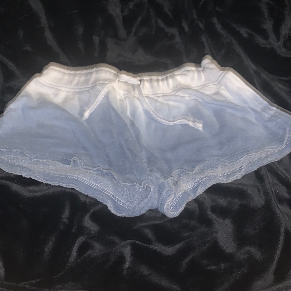 Women’s ombré white/blue comfy shorts.